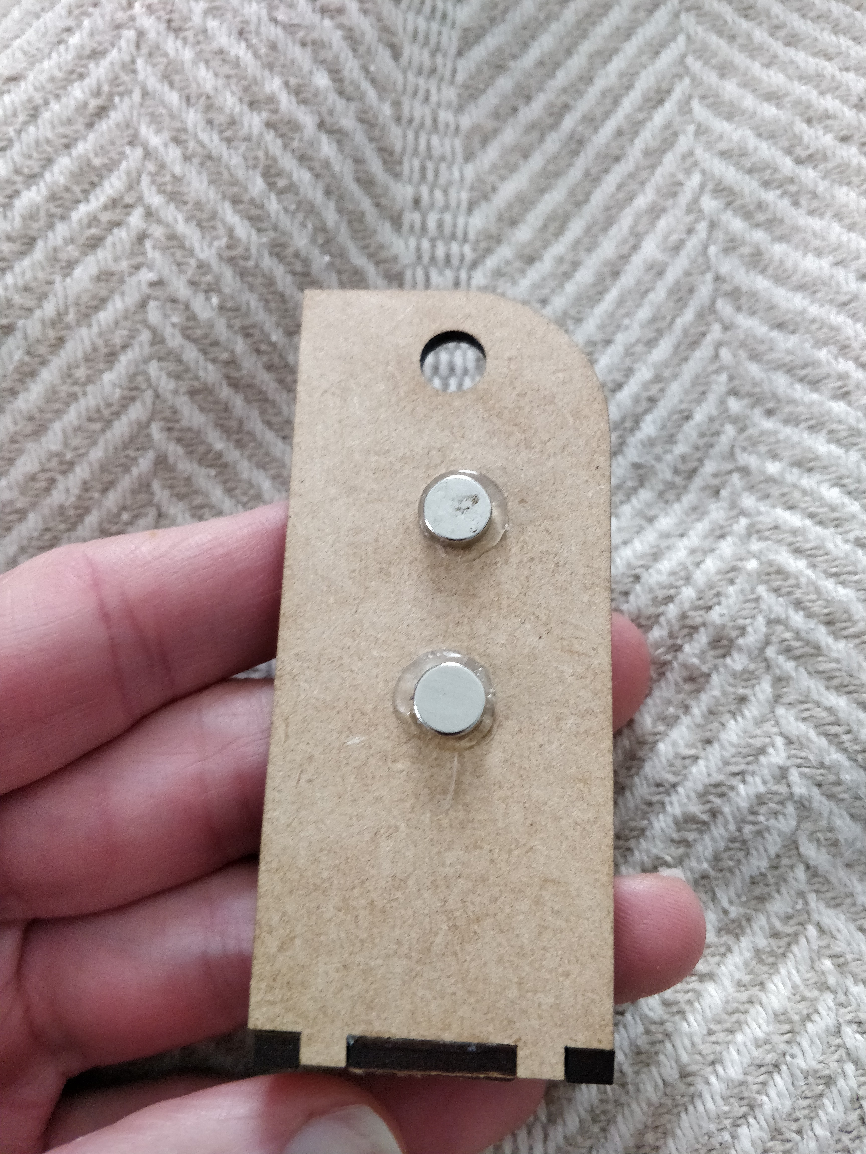 Taller backing board and two magnets