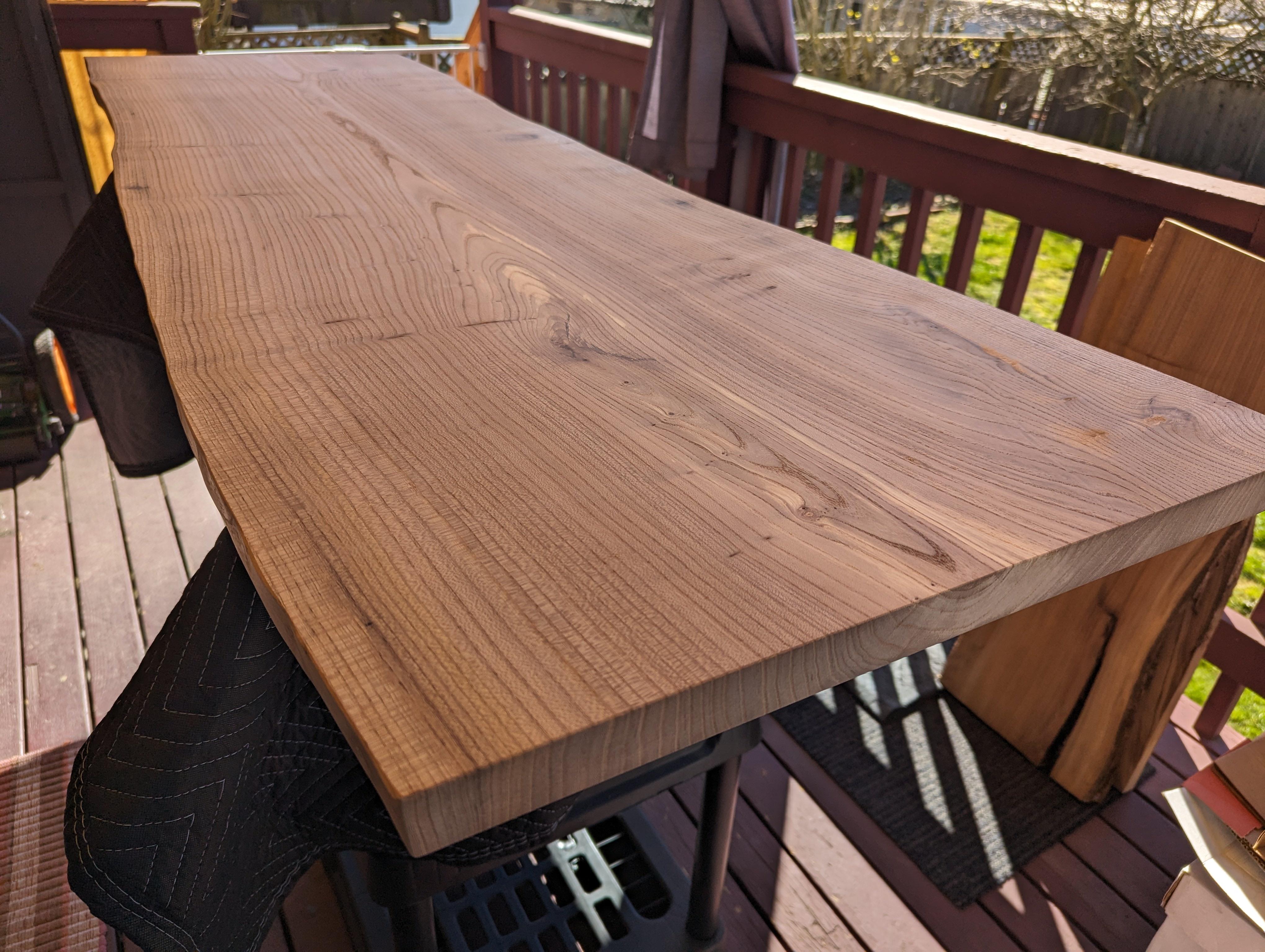 I rebuilt my standing desk by woodworking a live edge slab of English Elm into desk top.