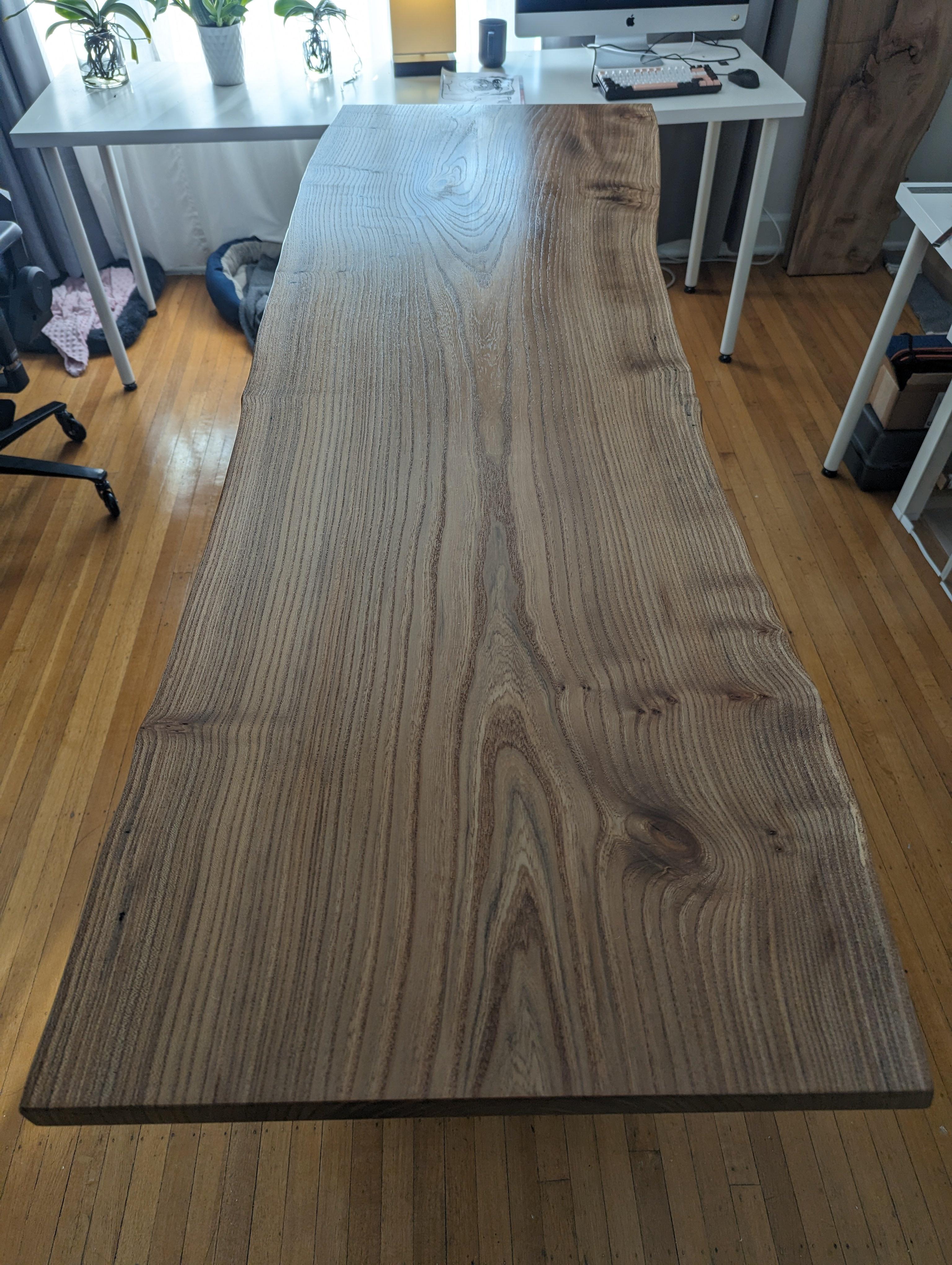 I rebuilt my standing desk by woodworking a live edge slab of English Elm into desk top.