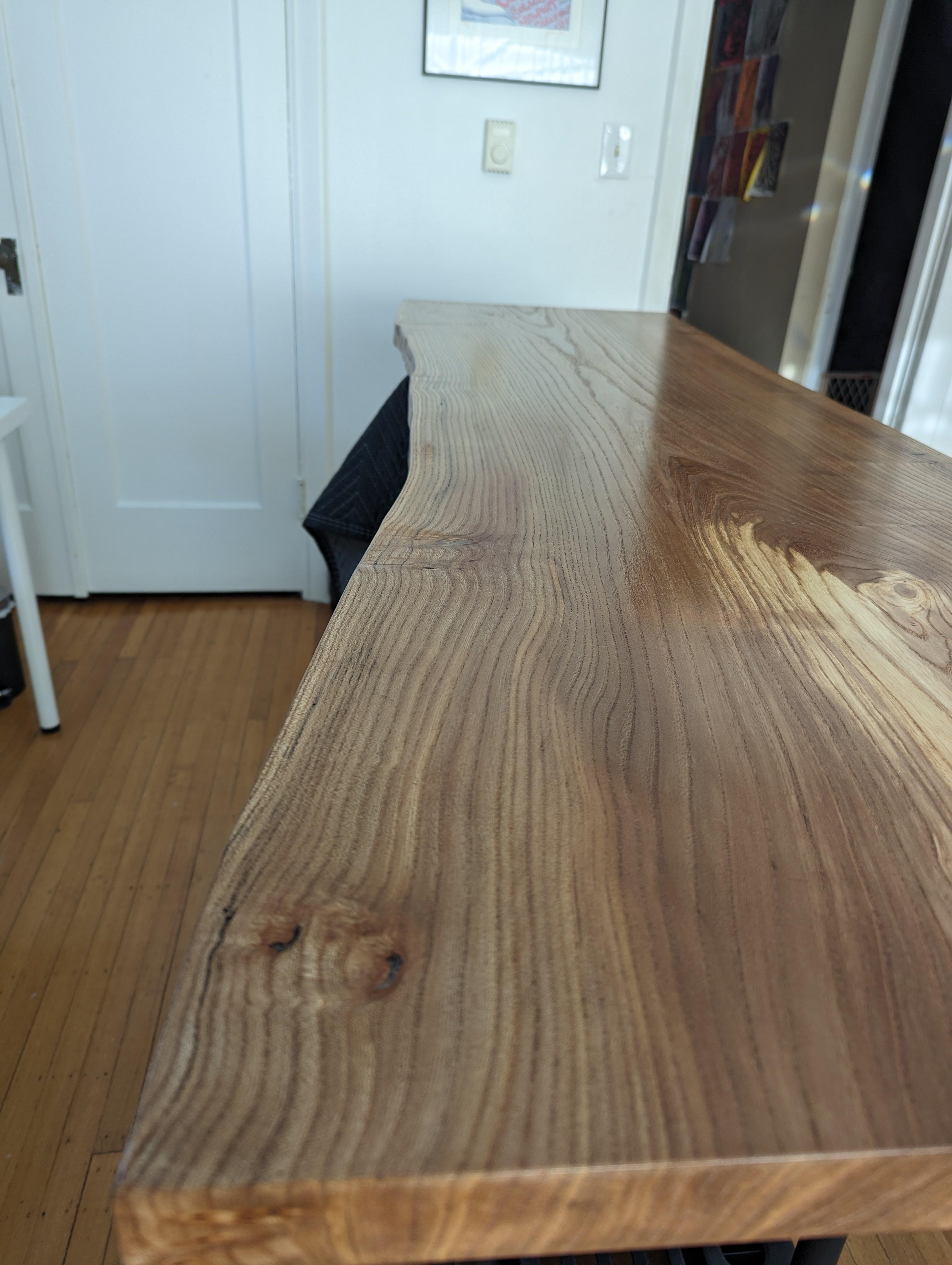I rebuilt my standing desk by woodworking a live edge slab of English Elm into desk top.