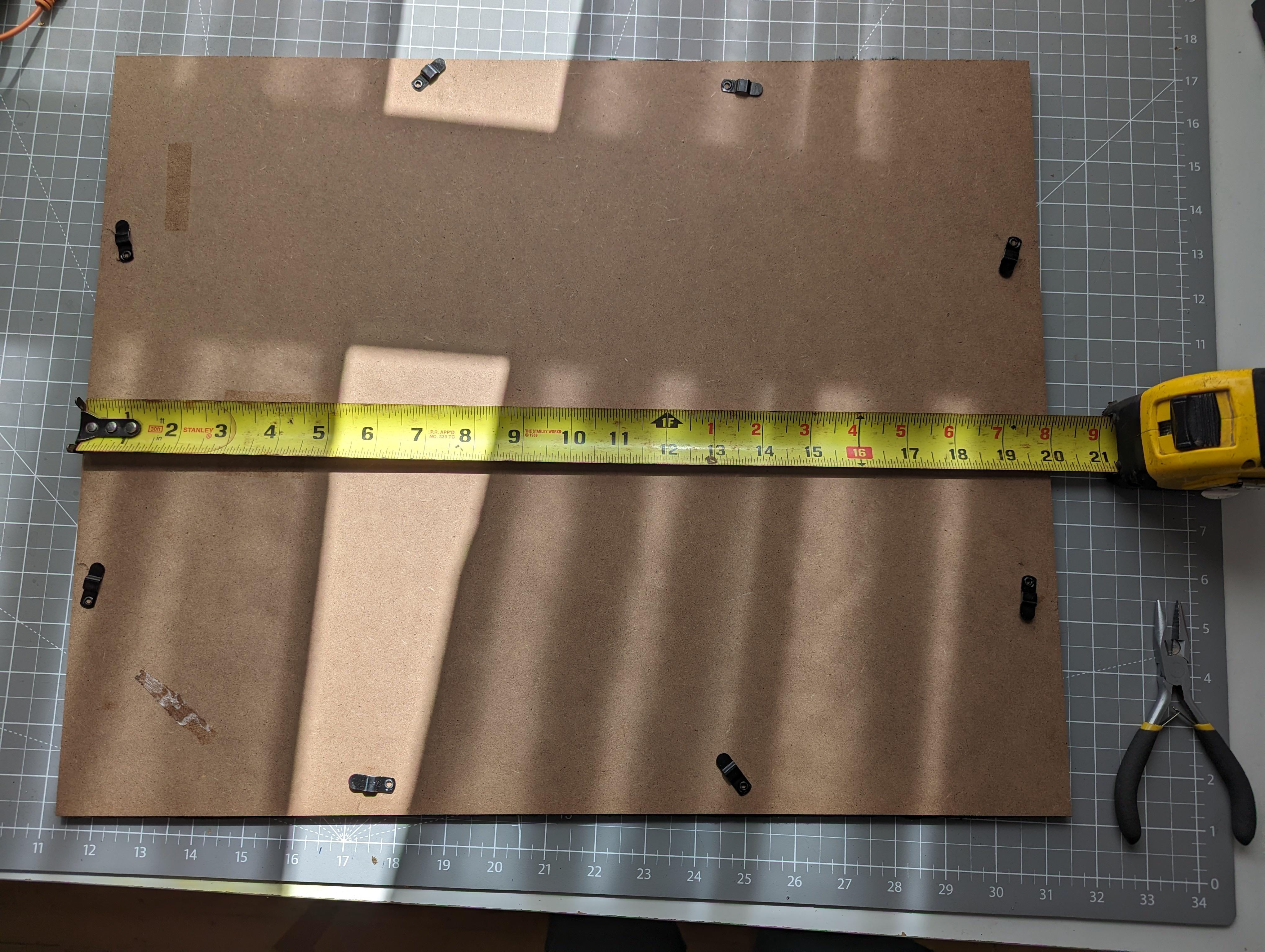Measuring backboard to cut metal